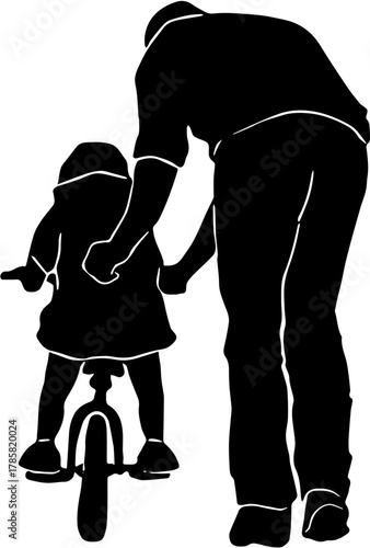 silhouette of a father with daughter learning a bicycle