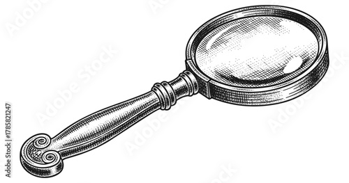 Engraved vintage magnifying glass with detailed handle