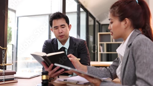 Lawyer or judge consult, Two lawyers discussing about contract and agreement concept.