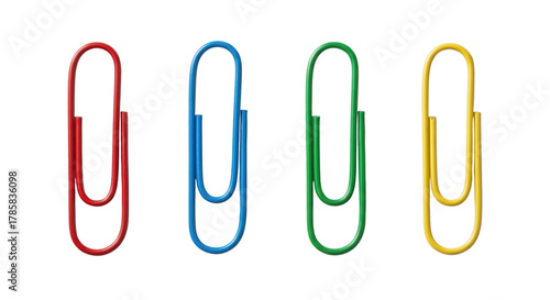 Four colorful paper clips in red, blue, green, and yellow isolated on transparent background