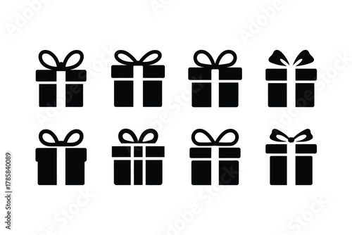 A collection of eight simple, black gift box icons with ribbons are displayed against a white background.