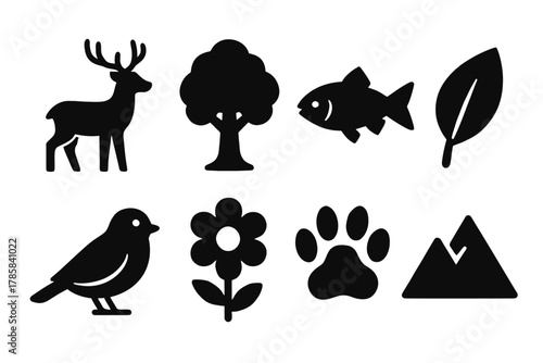 Nature icon set: deer, tree, fish, leaf, bird, flower, paw, mountain silhouettes