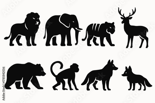 Silhouette collection of diverse wild animals featuring lion, elephant, tiger, deer, bear, monkey, wolf, fox
