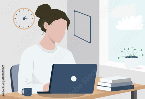 Freelancer working on a laptop in a cozy home office