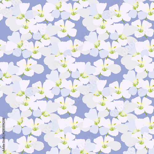 Floral seamless pattern with white flowers on a blue background. Ideas for textiles, fabric, backdrops, cards, and home decoration.