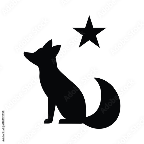 Silhouette of an arctic fox looking up at a christmas star