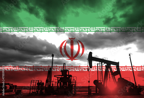 Drilling for oil in the countryside with Iran national flag overlay