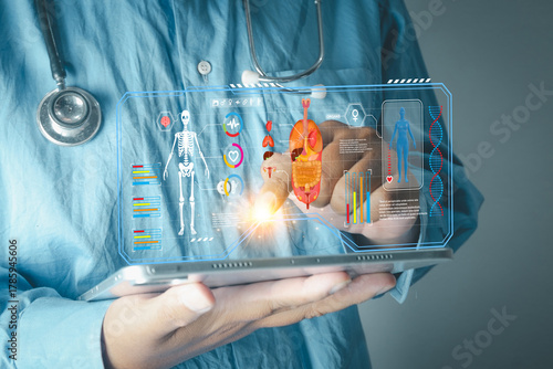 Healthcare and technology concept. Doctor's hand holding a tablet with a virtual medical interface showing human body, organs, and vital signs. Future of medicine, AI diagnostics, and science.
