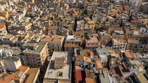 Tableau sur toile Aerial view of houses, apartments, and buildings in the historic center of Sciacca, in the province of Agrigento, Sicily, Italy
