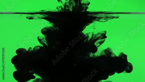Opaque Black Liquid Transition with cloud of paint mixing into water over green screen slowly filling the view distortion, overlay, glitch, static noise, scan lines on background, 4k animated video
