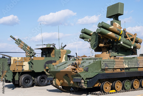 Camouflaged air defense and missile launcher vehicles