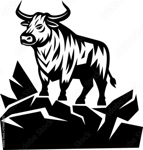 Powerful wild bull standing on rocky cliff, aggressive animal silhouette, strength and determination concept