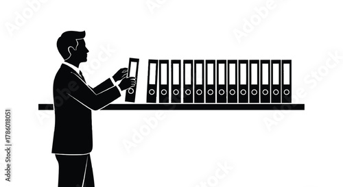 Silhouette of a businessman in a suit organizing and selecting a binder from a shelf full of identical binders