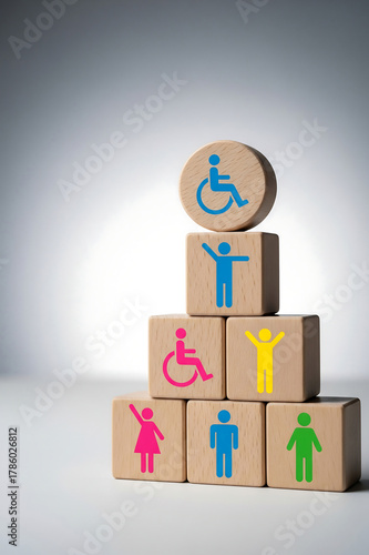 Diversity and Inclusion Concept. Wooden blocks stacked with diversity and disability icons