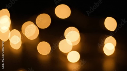 Soft Focus Glowing Lights on a Dark Background in Artistic Setting