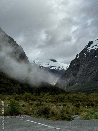 Snowy mountain behind the fog