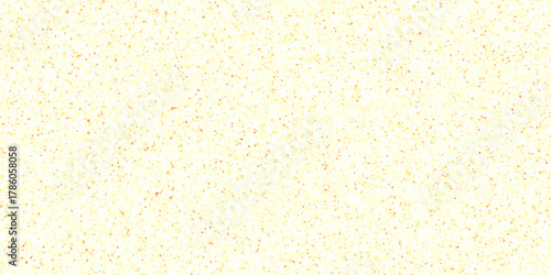 Soft pastel yellow speckled textured cardstock paper background. A flat texture of off-yellow cardboard paper background textured. pebble stone yellow for interior floor and wall materials.

