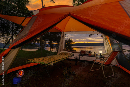 Camping tent, view from inside the tent to see the view outside the mountain, forest, lake, camping tent on a high mountain