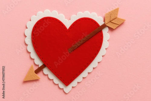 Romantic red heart pierced by cupid's arrow on a festive background design and love concept