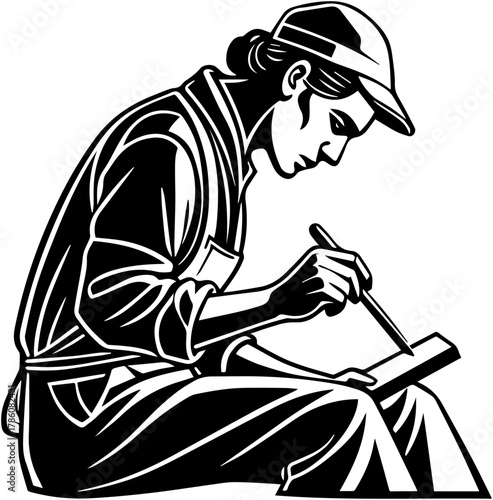 Silhouette of Artisan Carving or Crafting on Tablet – Manual Work Scene