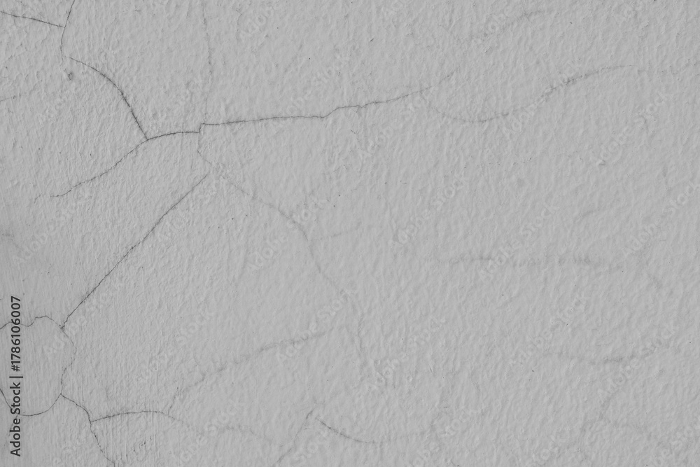 Obraz premium Grungy Concrete Wall Texture Background with Fine Cracks and Rough Surface