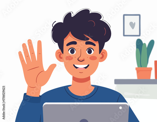 Young man waving with a smile, using a tablet in a bright, modern setting.