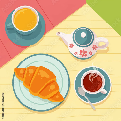 A delightful overhead view of a croissant, cup of tea, and teapot on a wooden table, perfect for breakfast or brunch imagery