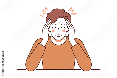 A person holds their head in their hands, experiencing a headache or migraine.