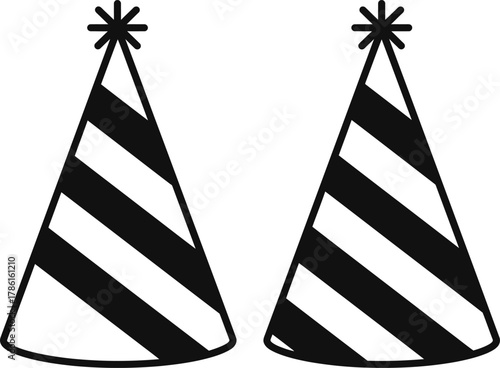 Two party hats with black and white stripes, decorated with star-shaped embellishments at the top.
