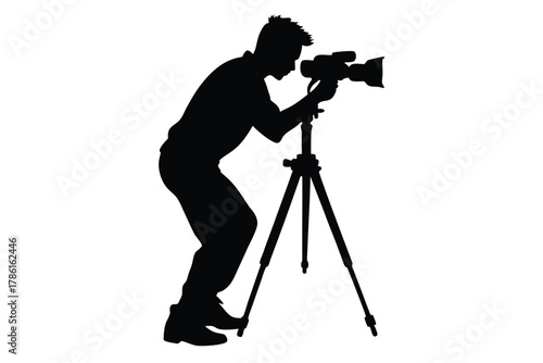 man-taking-photo-using-tripod-black-and-white-silhouette