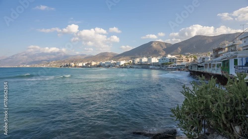 Time lapse of sea, clouds and Limenas Chersonisou on a sunny day, Limenas Chersonisou, Crete, Greek Islands, Greece, Europe