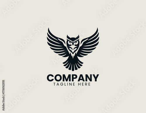 Majestic owl silhouette vector logo illustration with powerful, symmetrically spread wings and detailed feather texture. Wisdom and power concept