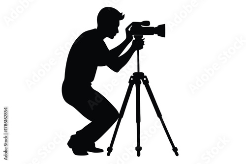 man-taking-photo-using-tripod-black-and-white-silhouette