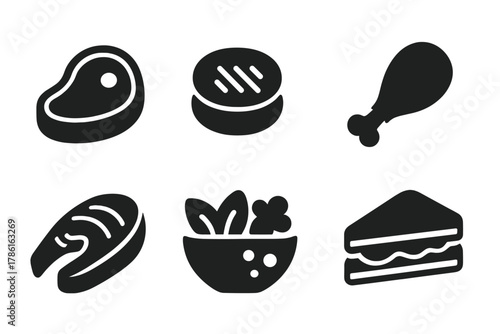 Solid Food Icons. Solid style icons of food products: steak, burger patty, sausage, chicken leg, fish fillet, salad bowl, cheese