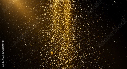 Wallpaper Mural Golden glitter particles exploding in a dark background, creating a magical and celebratory atmosphere for special events and abstract designs Torontodigital.ca