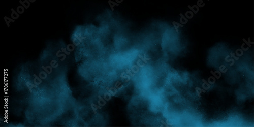 Blue powder dust smoke on black background. abstract background. Space of night sky with cloud and stars. Nebula and galaxies in space. Abstract cosmos background.