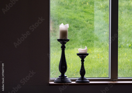 Carta da parati vintage and old candlestick on windowsill