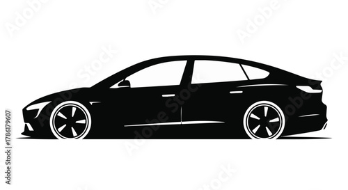 Sleek black sedan with modern design and custom wheels, isolated on white background.