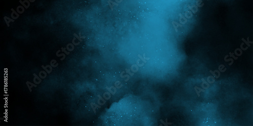 Blue powder dust smoke on black background. abstract background. Space of night sky with cloud and stars. Nebula and galaxies in space. Abstract cosmos background.