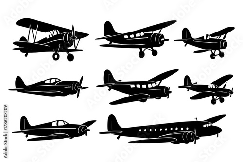 Silhouette collection of vintage airplanes on white background
