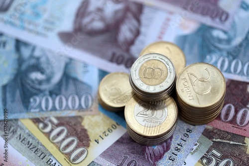 Bunch of Hungarian Forint currency money bills and coins. HUF currency banknotes and coins close up