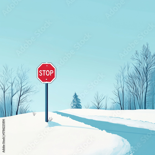 Stop sign on snowy road surrounded by barren winter trees  