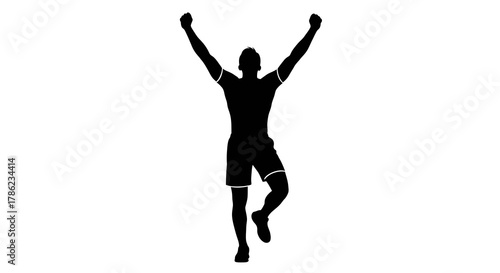 Silhouette of celebrating athlete with arms raised captures victory energy and movement