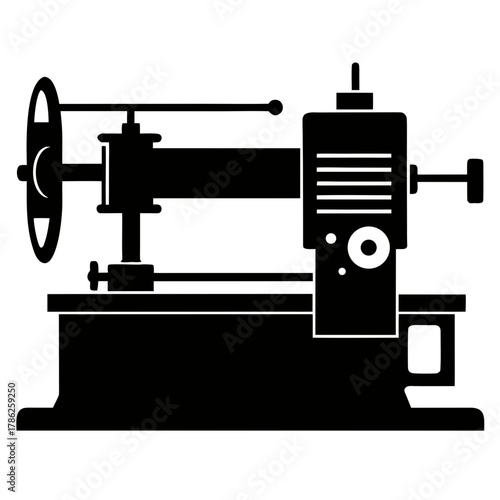 Industrial lathe machine in black silhouette