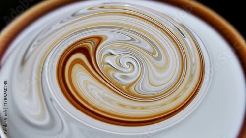 Abstract Swirls Of Cream And Coffee Blend Together In A Mesmerizing Circular Pattern View From Above