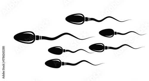 Several sperm cells with tails swimming towards the left on a white background.