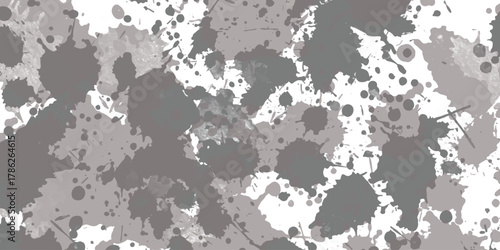 Abstract grey ink paint splatters background texture graphic isolated on white background