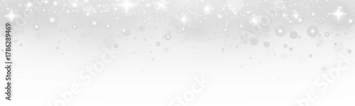 Luminous stardust and glowing particles with sparkling flare. Christmas decorations, shimmering overlays, and glittering effects for a festive atmosphere.