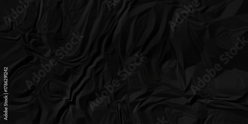 Dark black page wrinkle cardboard crumpled satin fabric ripped cloth decoration background	
