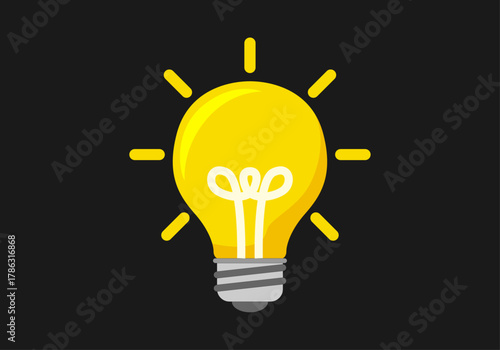 Bombilla encendida en fondo negro